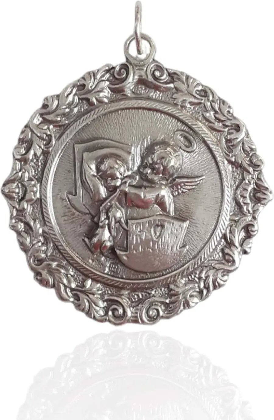 Medalla niño en la cuna