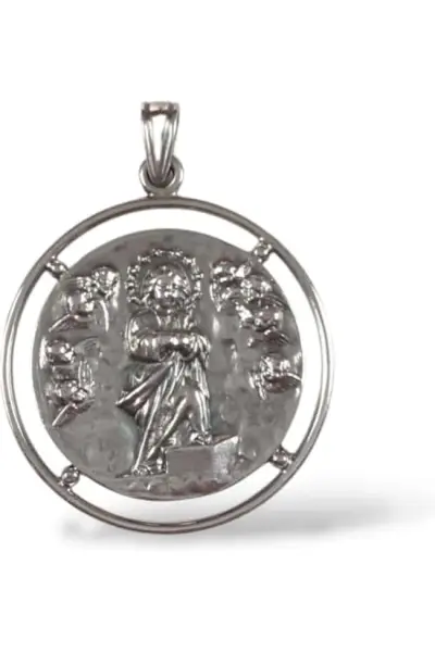 Medalla de la Virgen Niña. Plata de ley.