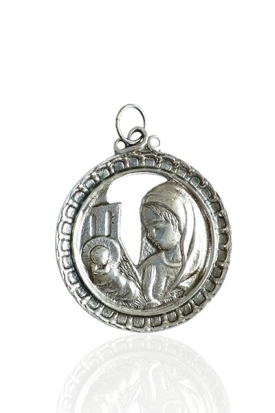 Medallla de cuna Virgen con niño calada, pequeña. Plata
