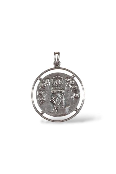 Medalla de la Virgen Niña. Plata de ley.